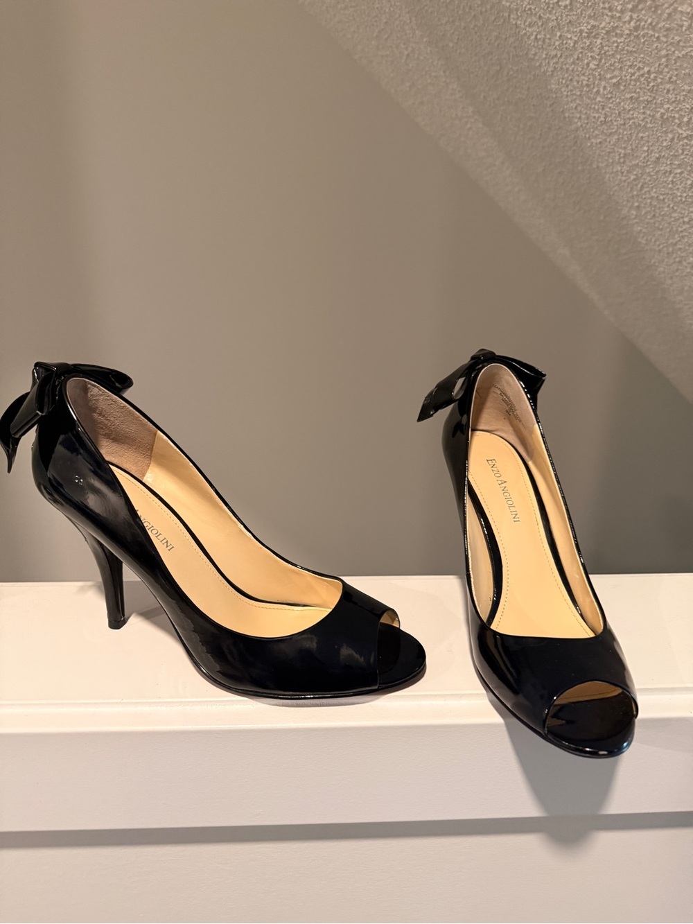 black patent leather peep toe bow heels